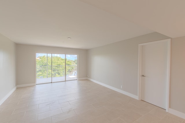 empty room featuring light tile patterned floors