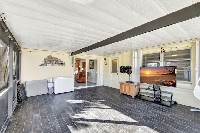 sunroom / solarium with beam ceiling