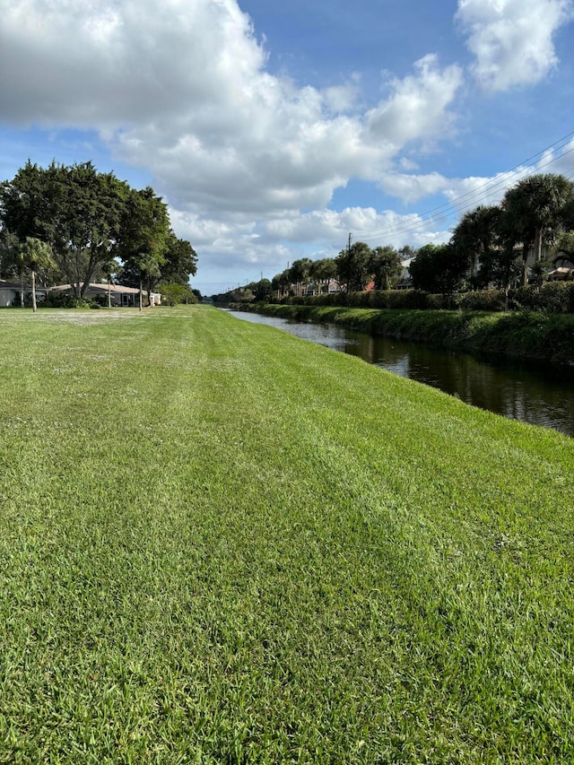 view of yard with a water view