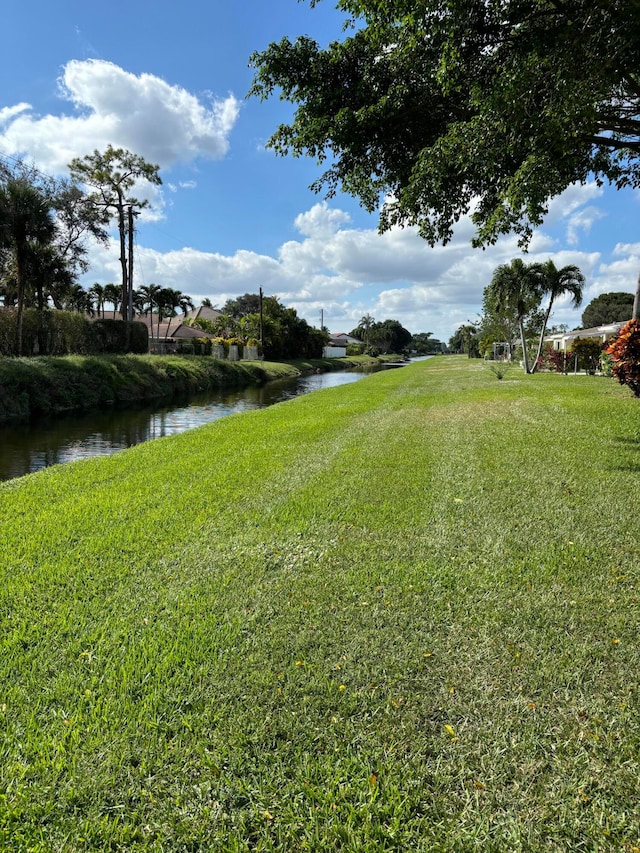 view of yard with a water view