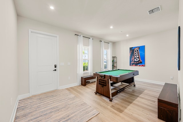 playroom with light wood-type flooring and billiards