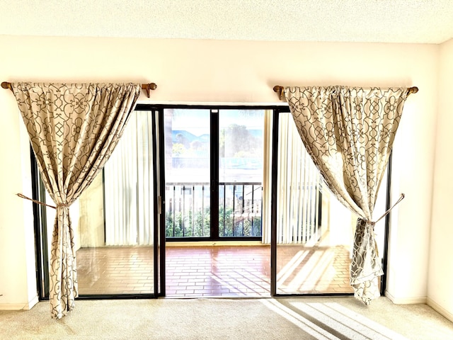 200 SE Four Winds Dr Unit 213, Stuart, FL 34996 - bonus room featuring carpet flooring and a textured ceiling