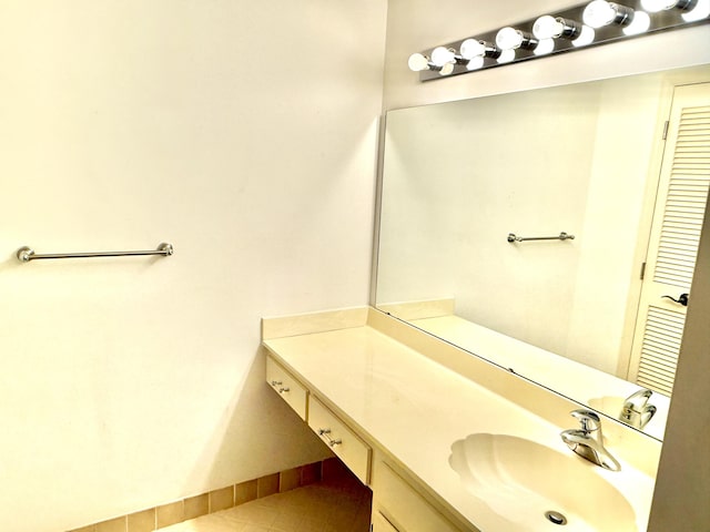 200 SE Four Winds Dr Unit 213, Stuart, FL 34996 - bathroom featuring vanity and tile patterned flooring