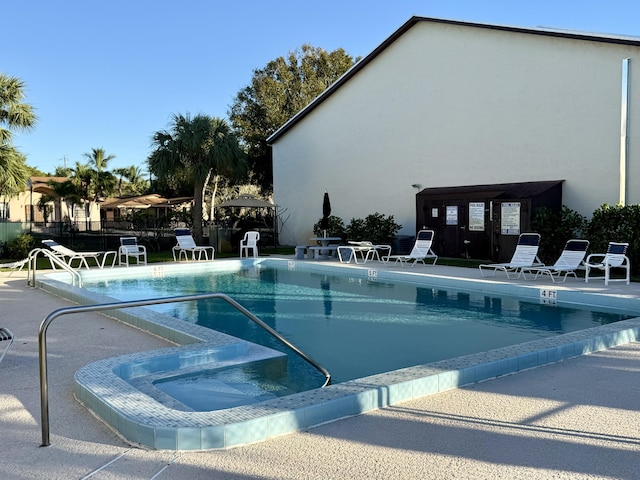 200 SE Four Winds Dr Unit 213, Stuart, FL 34996 - community pool with a patio area