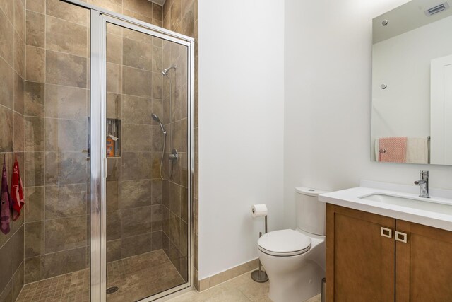 bathroom with walk in shower, vanity, and toilet