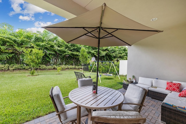 view of patio / terrace featuring outdoor lounge area and a playground