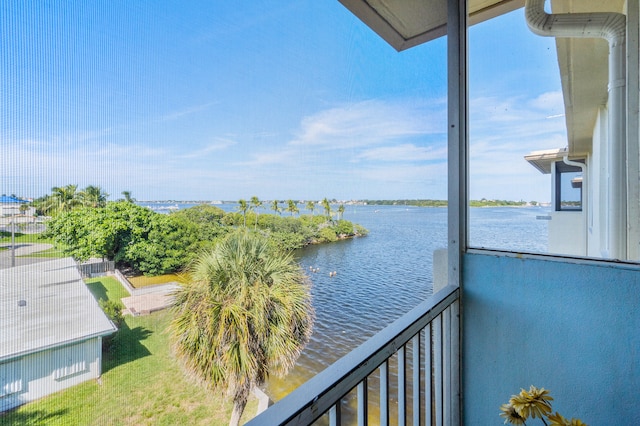 balcony featuring a water view