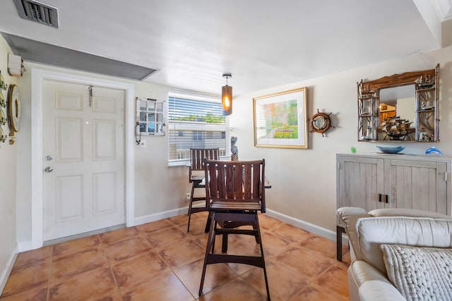 sitting room with light tile patterned flooring