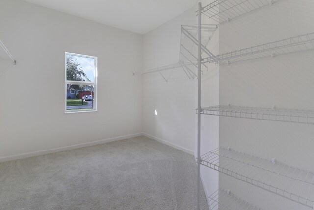 washroom with hookup for an electric dryer, washer hookup, light tile patterned floors, and hookup for a gas dryer