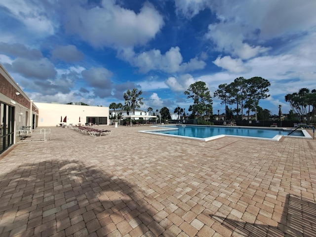 view of pool with a patio area