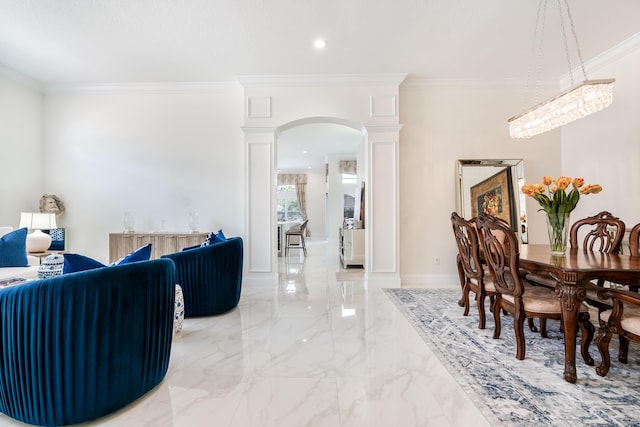 interior space with ornamental molding and ornate columns