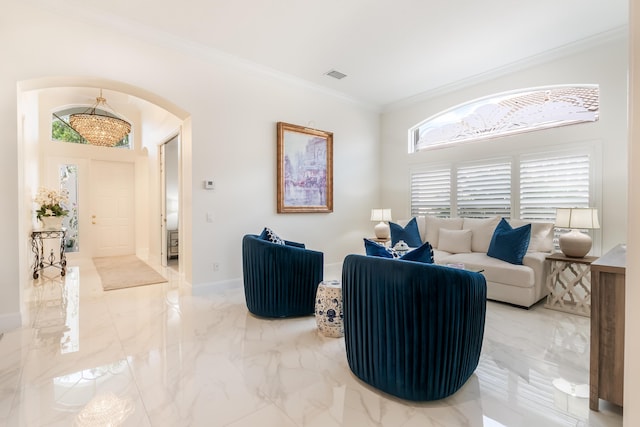 living room with ornamental molding and a wealth of natural light