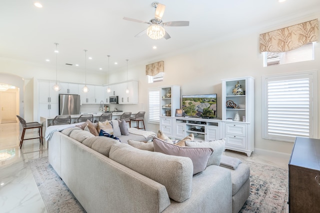 living room with ceiling fan