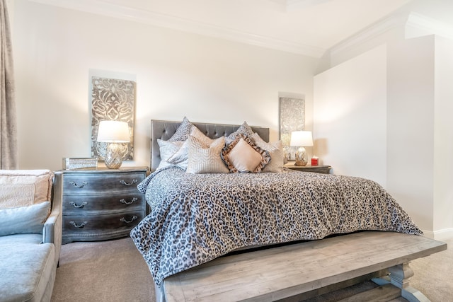 carpeted bedroom with crown molding