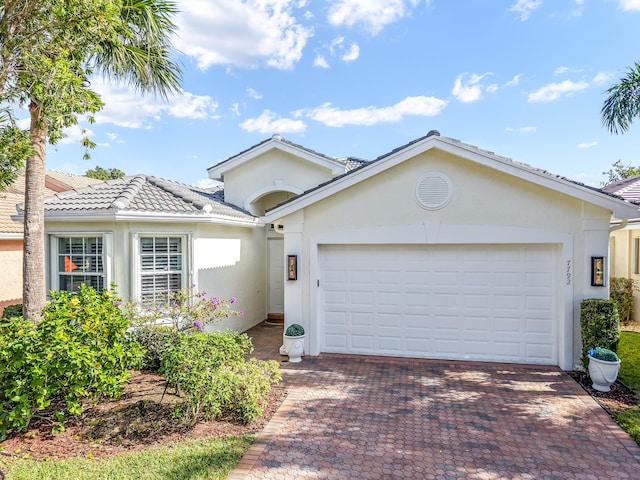 view of front of house with a garage