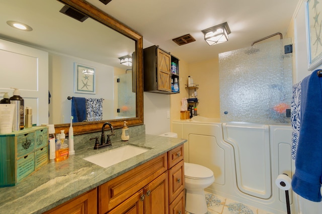 full bathroom featuring tile patterned floors, vanity, toilet, and shower / washtub combination