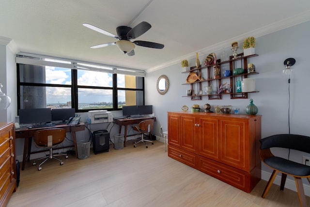 office featuring ceiling fan and crown molding