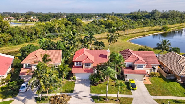 drone / aerial view with a water view