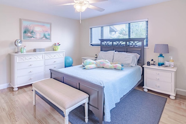 bedroom featuring light hardwood / wood-style flooring and ceiling fan