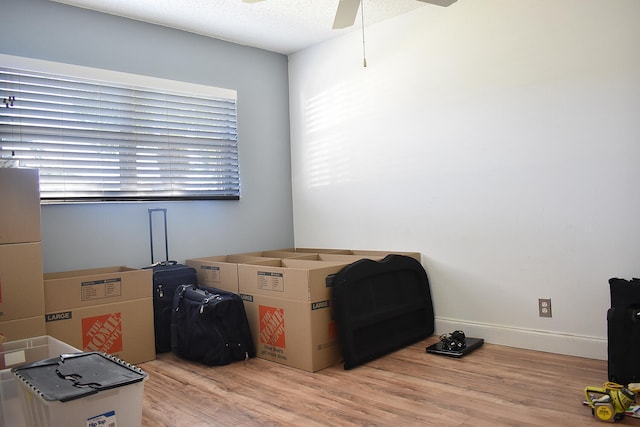 storage area featuring ceiling fan