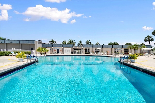 view of swimming pool featuring a patio area