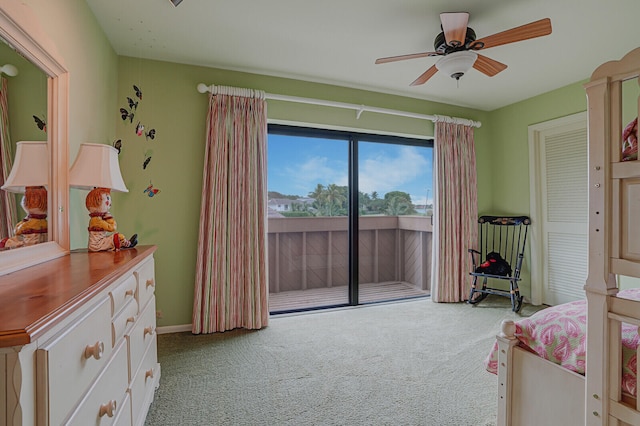 bedroom with carpet flooring, access to outside, and ceiling fan