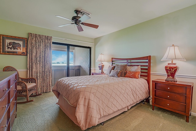 carpeted bedroom with access to outside and ceiling fan