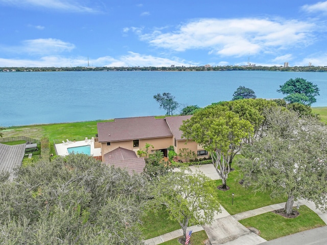 birds eye view of property featuring a water view