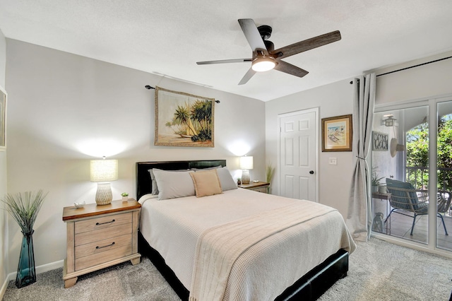 carpeted bedroom with access to outside and ceiling fan