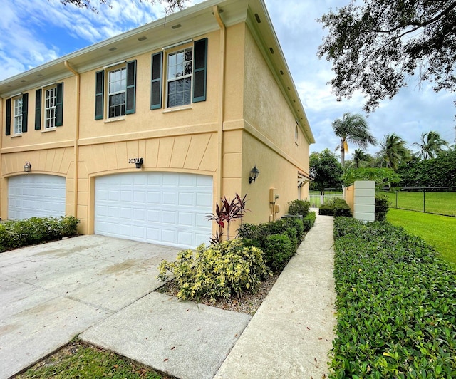 view of home's exterior with a garage