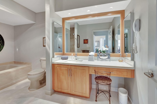 bathroom with tile patterned flooring, vanity, toilet, and a bathing tub