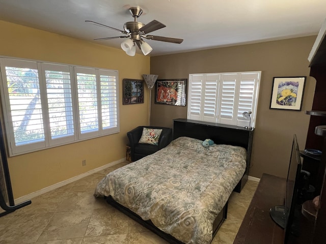 bedroom featuring ceiling fan