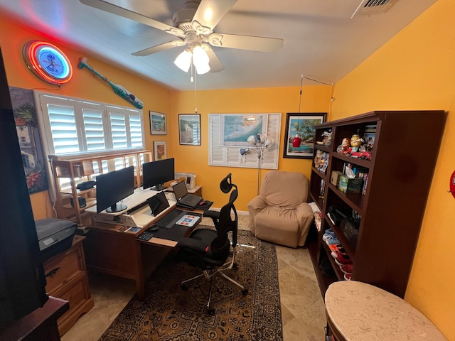 office space with ceiling fan