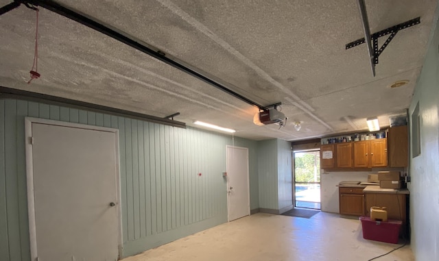 garage featuring a garage door opener