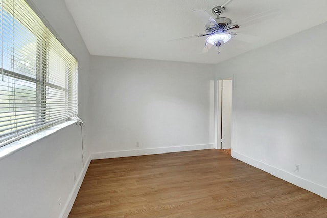 empty room featuring light hardwood / wood-style floors and ceiling fan