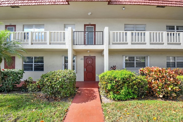 exterior space featuring stucco siding