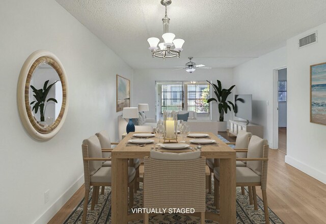 kitchen featuring light hardwood / wood-style floors, white cabinetry, and white appliances