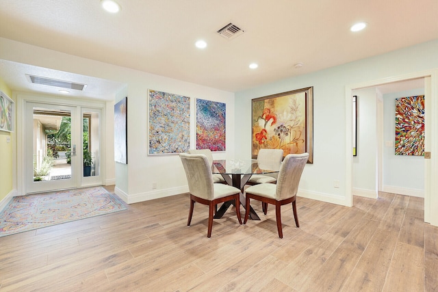 dining room featuring light wood-type flooring