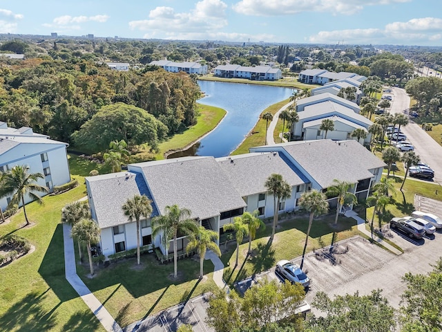 drone / aerial view with a water view