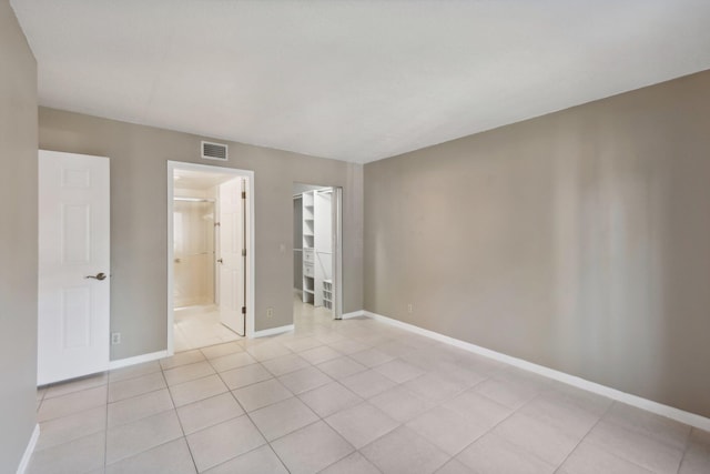 view of tiled spare room