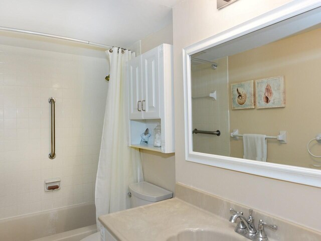 full bathroom with vanity, toilet, and shower / tub combo