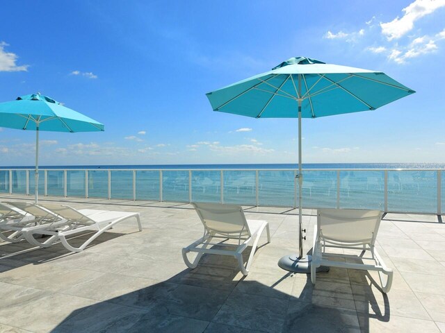 view of patio / terrace featuring a water view