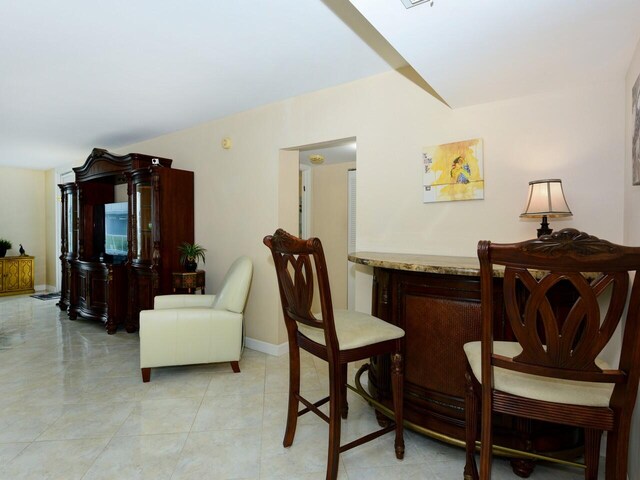 sitting room with light tile patterned flooring