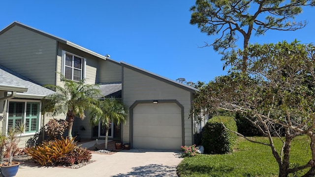 view of front of property featuring a garage