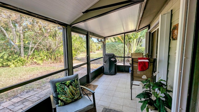 sunroom with lofted ceiling