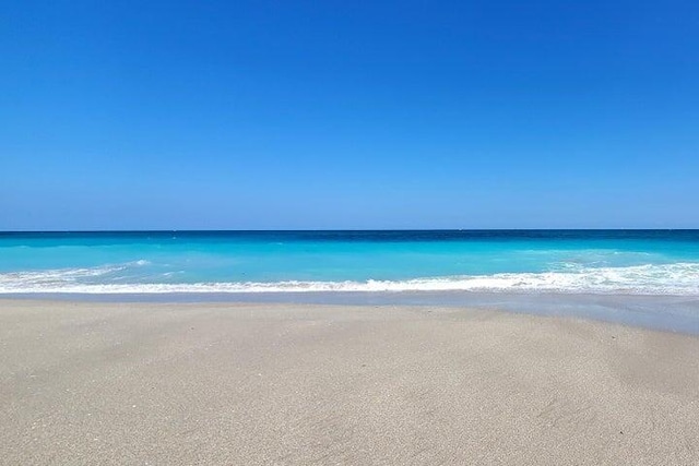 view of water feature featuring a beach view