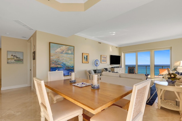 dining room with crown molding