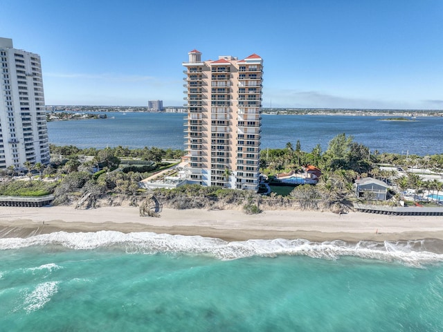 bird's eye view with a view of the beach and a water view