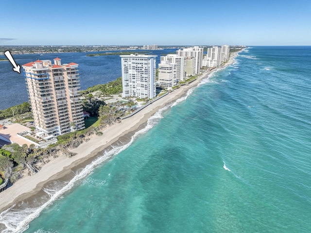 bird's eye view with a beach view and a water view