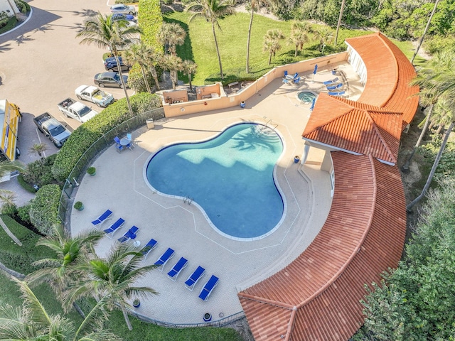 view of swimming pool with a patio